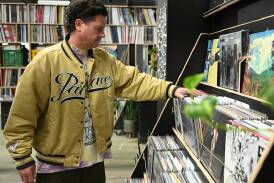 Soundmerch record store owner Tim Everist says vinyl provides the ultimate listening experience. (James Ross/AAP PHOTOS)