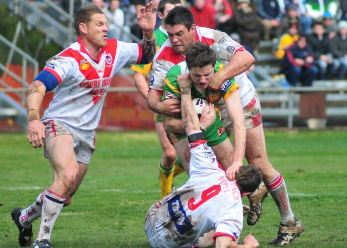 Simon Osborne (left) playing for Mudgee Dragons in the 2010 Group 10 grand final. He is preparing to tackle CYMS' Ben McAlpine. Picture is from file
