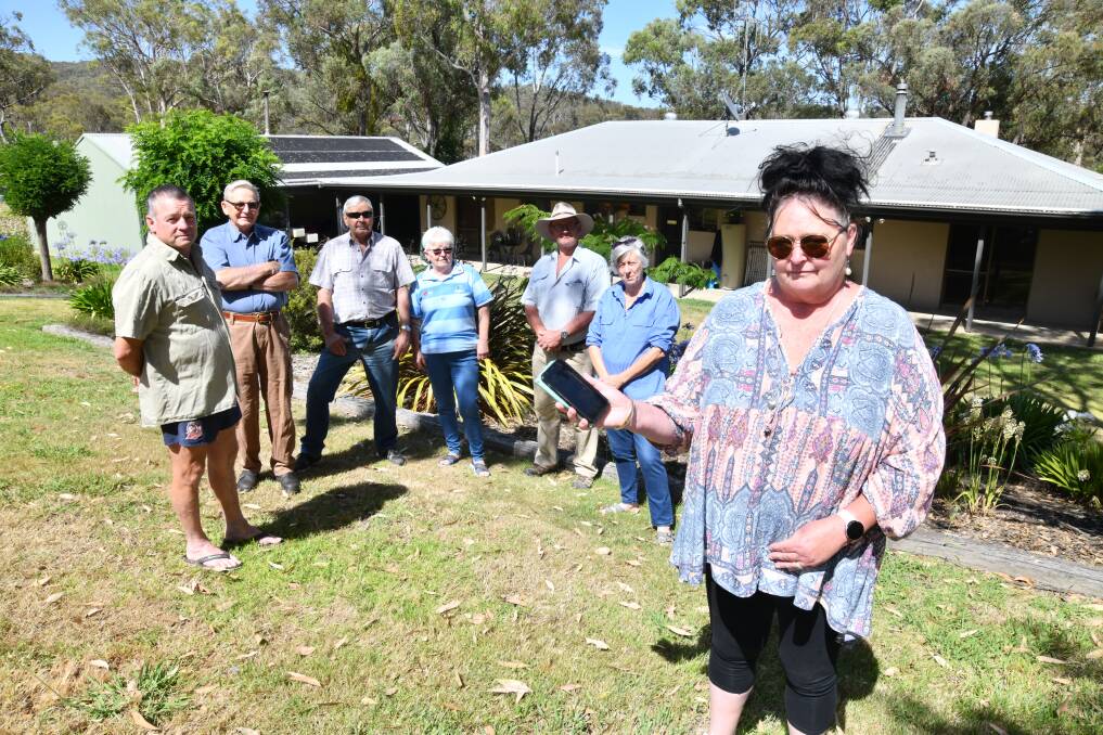Ophir Road residents John Spicer, Ray Astill, Harry White, Sue Gore, Ted and Narelle Lewis with Learne Spicer back in January, 2023. Picture by Jude Keogh