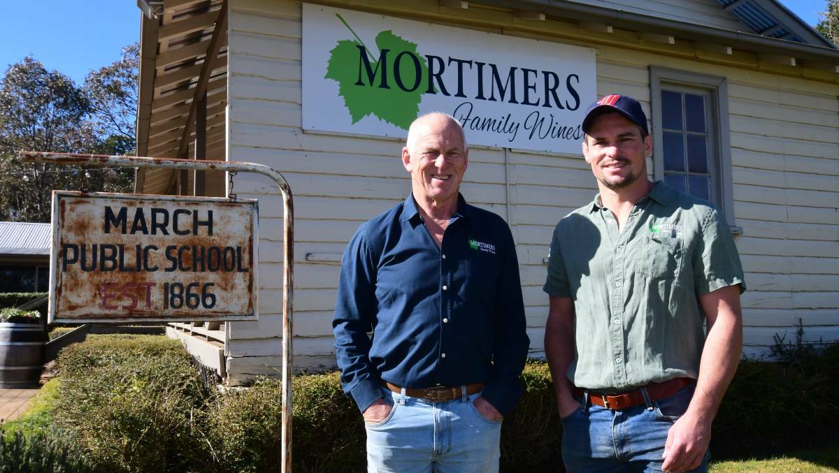 Peter Mortimer with son Daniel Mortimer, cellar door manager of the Old March School House, now run wine school classes at Mortimers Wines. Picture by Carla Freedman.