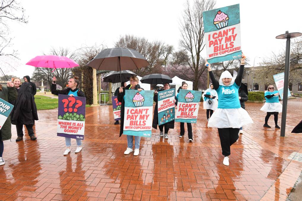 Droves of Orange's early childhood educators rallied in the rain on September 7, protesting for better wages and improved working conditions in their sector. Picture by Jude Keogh.
