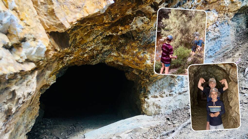 An old mining tunnel opening at Ophir Goldfields, with my siblings and son walking the site's trail (with my brother later terrifying him). Pictures by Emily Gobourg.