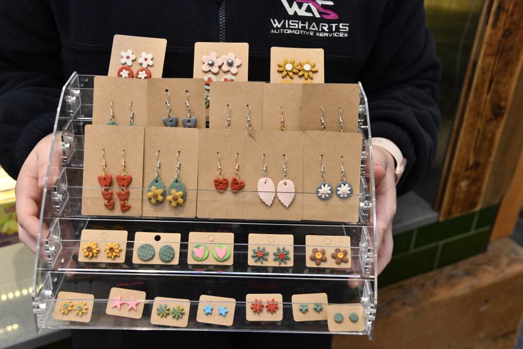 Orange's Laura La Spina will donate one dollar to charity from every earring set she sells at The Middle Coffee Shop on May 20 for Australia's Biggest Morning Tea. Picture by Carla Freedman.