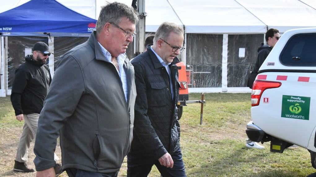 Cabonne Shire mayor Kevin Beatty with Anthony Albanese in Eugowra, with council's ongoing lobbying to both state and federal governments for the current buy-back program to be accelerated. Picture by Carla Freedman.