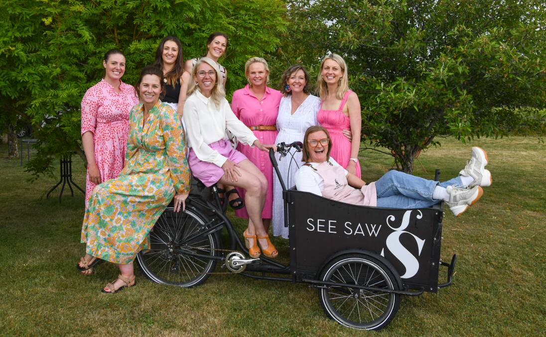 Expo artists Eve Hoskins, Kayla Henley, Marissa Lico, Yani Lenehan, Annabel Wykamp, Carina Chambers, Sophie Corks and Leesa Ronald with See Saw Wines owner, Alice Jarrett. Picture by Carla Freedman.
