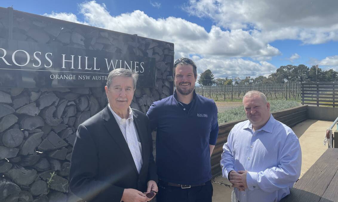 The CEO of Sydney's International Convention Centre Geoff Donaghy (left), Luke Steele of Ross Wines (centre), and ICC head sommelier William Wilson (right) at Ross Hill Wines in Orange. 