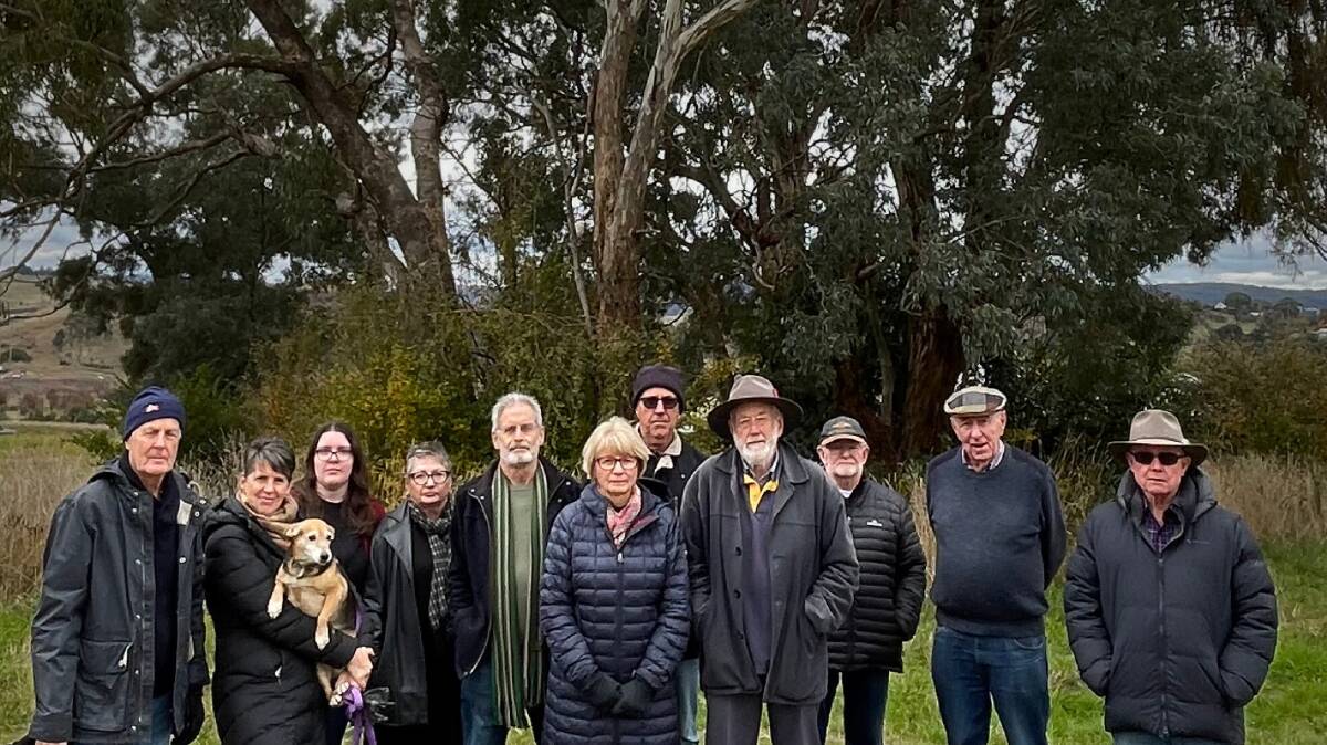 Environmentally Concerned Citizens of Orange (ECCO) at the Maramba Road site. (left to right) Neil Jones, Fiona Hawke, Keira Mallard, Liz Murrell, Stephen Nugent, Libby Jones, Robert McLaughlin, Nick King, Malcolm Stacey, Col Foster, and John McDonell. 