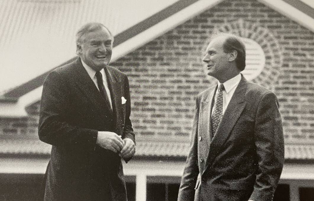 The end of an era. Outgoing Rural Press managing director, John Parker, and his successor, Brian McCarthy, in the mid-1990s outside the prominent headquarters he built during the fast emerging company's formative years a decade earlier.