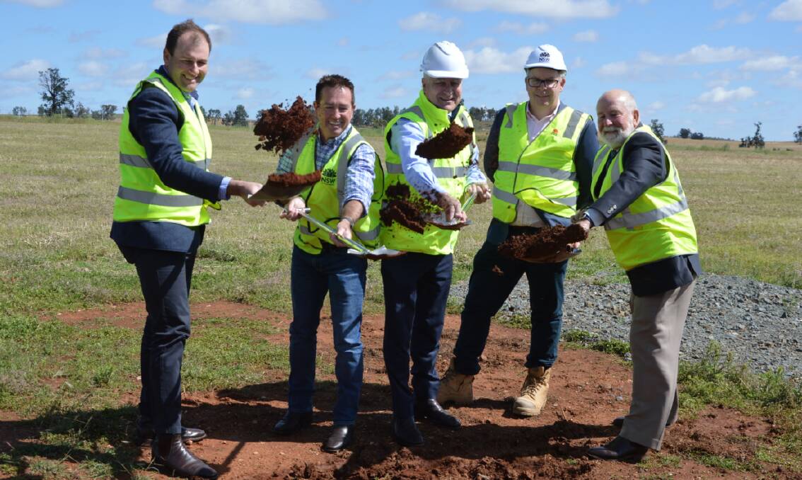 Then-parliamentary secretary to the Deputy Premier, Sam Farraway; then-Deputy Premier Paul Toole; Member for Riverina Michael McCormack; Transport for NSW's Alistair Lunn; and then-mayor Ken Keith turn the first sod on the Newell Highway bypass of Parkes in November 2021. Picture by Kristy Williams.