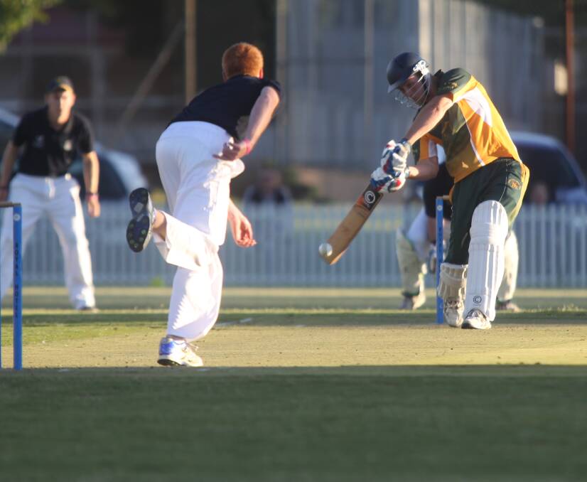 WINNING FORM: Dwyer tees off during his innings in the 2014-15 Royal Hotel Cup final against Cowra. Photo: PHIL BLATCH 0306pbcrick5
