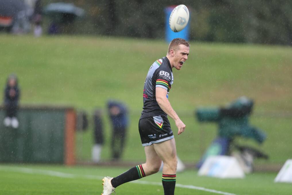 Nick Tilburg celebrates after scoring Panthers' third try. Picture by Phil Blatch