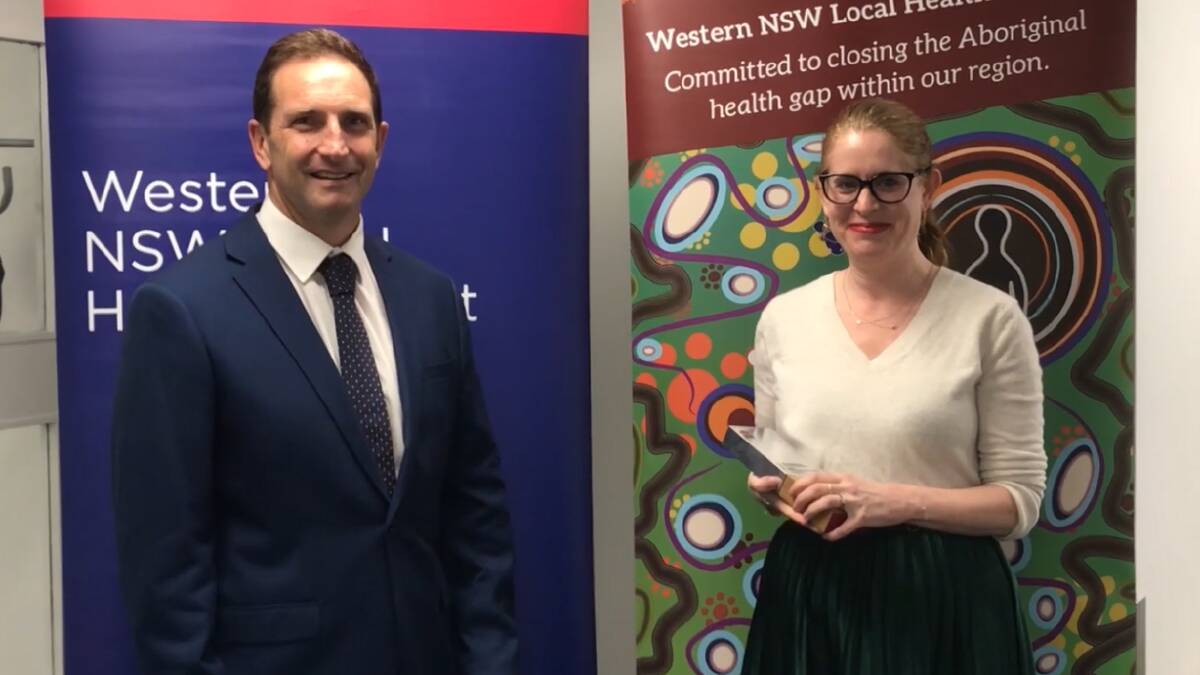Spotless Contract Manager Tim Robinson and Western NSWLHD's Medical Director Clinical Quality and Patient Safety, and Emergency Medicine Specialist, Dr Melanie Berry, the 2022 Spotless Collaborative Staff Member of the Year. Picture supplied.