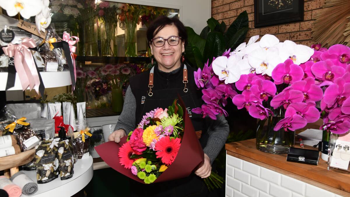 Pick Me Flowers and Gifts owner Jane Hyde in her Orange shop. Picture by Jude Keogh