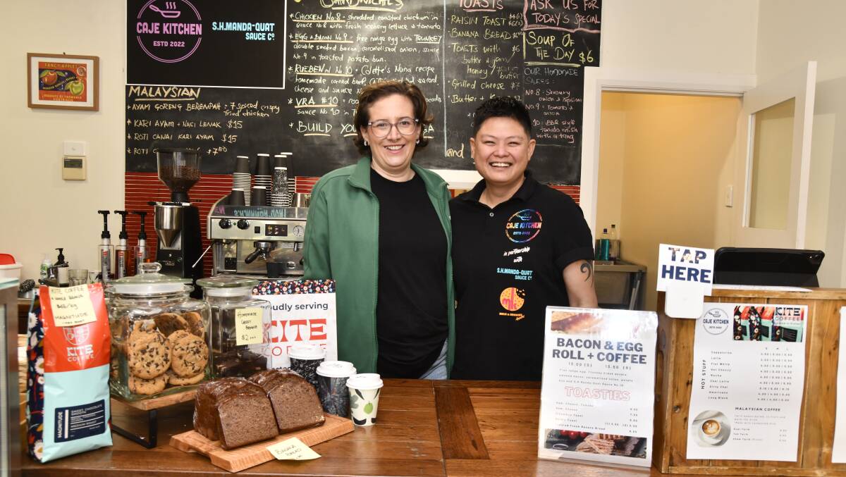 Colette Beguin and Juilan Ooi behind the counter of their new cafe Caje Kitchen at The Wellness House. Picture by Jude Keogh