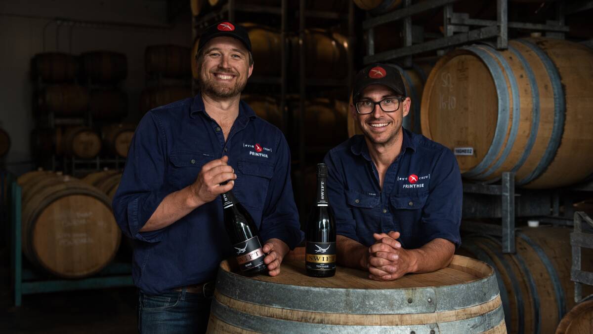 Dave and Ed Swift of Printhie Wines holding some of their Swift Sparkling range. Picture supplied