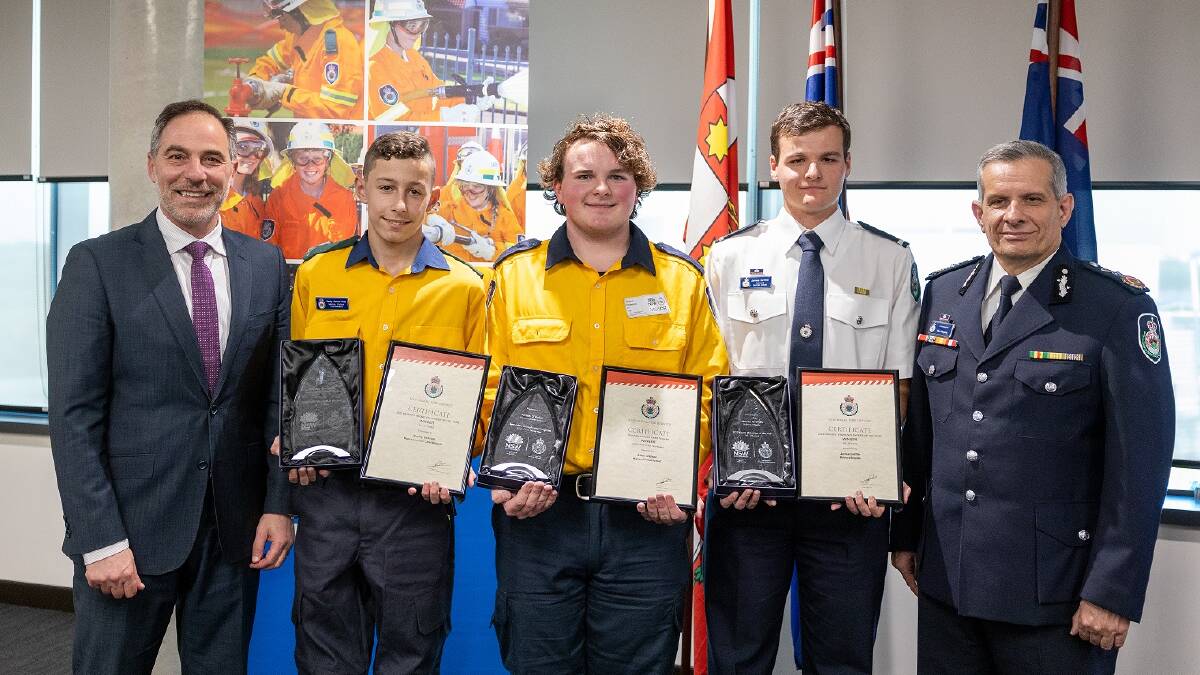 Aiden O'Brien (centre) with his Cadet of the Year award at the 2023 Rural Fire Service NSW youth awards. Picture supplied