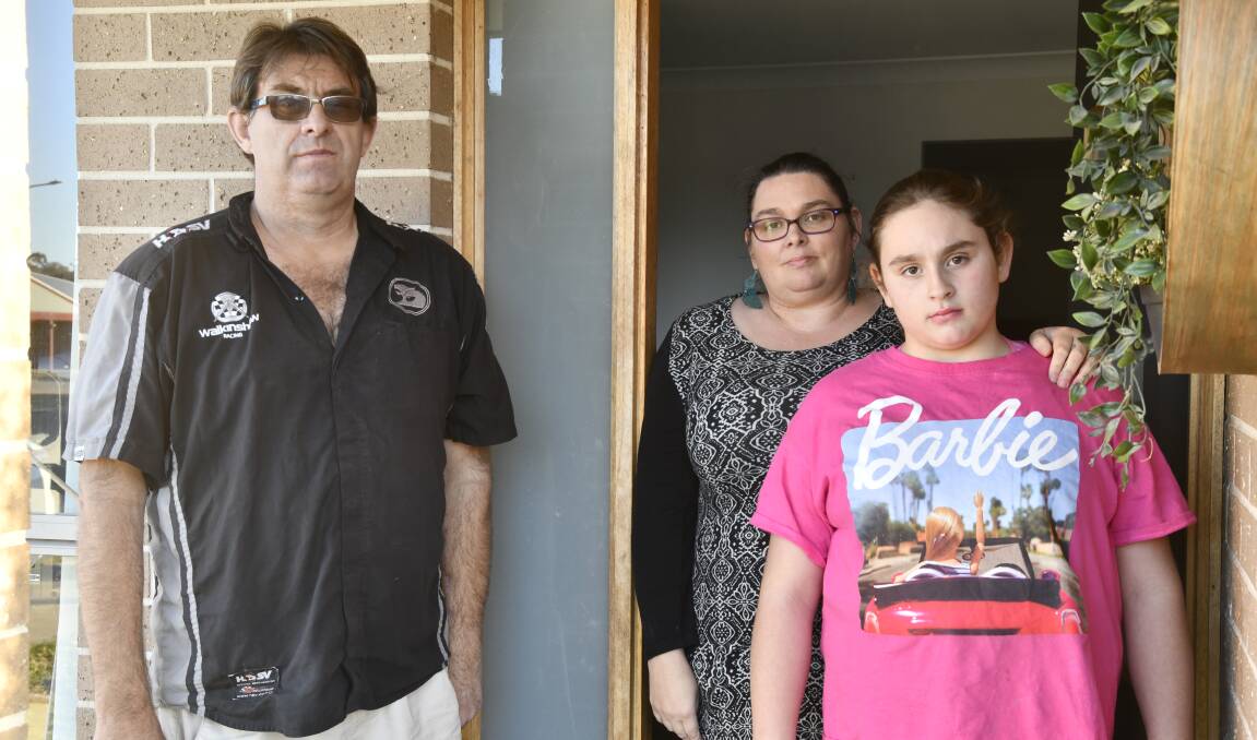 Rod, Candice and Cienna Lonard were left 'peed off' after their two cars were stolen. Picture by Jude Keogh