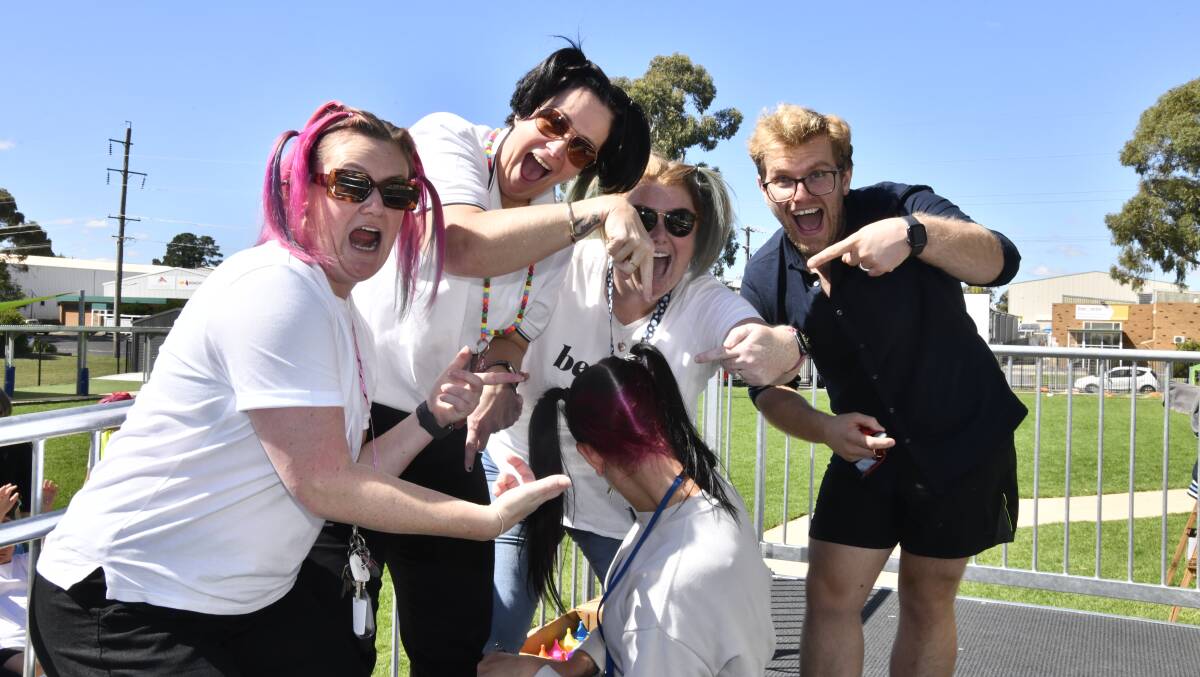 These teachers from Anson Street School coloured their hair, shaved it all off and waxed their legs to raise money for the Cancer Council. Picture by Carla Freedman.