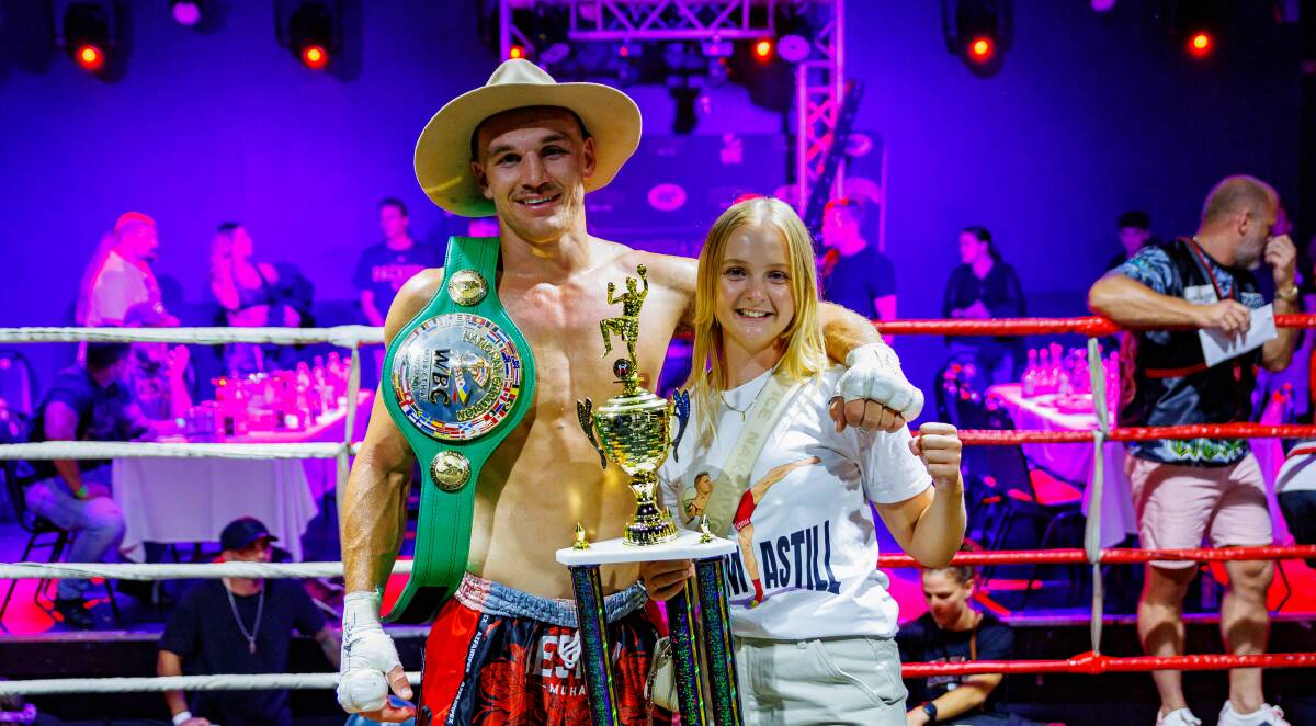 Jesse Astill, pictured alongside partner Sarah Smith, after winning the Australian WBC title on February 25. Picture by Scott Waye.