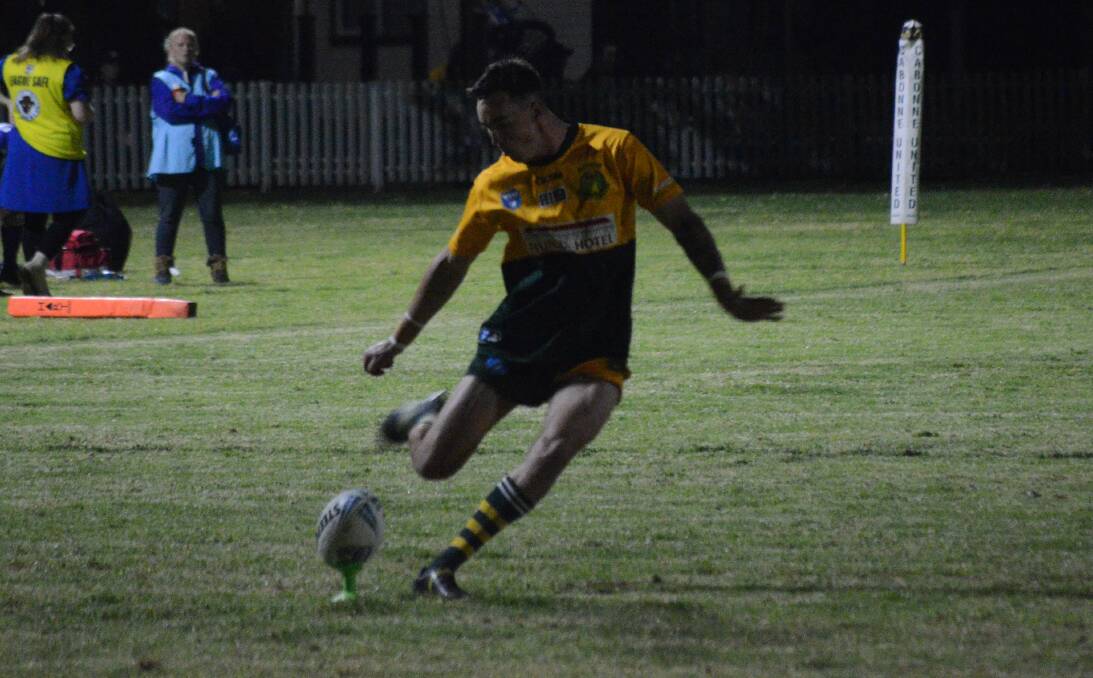 Trundle Boomers half-back Mitch Wright slotting home one of nine conversions against the Molong Bulls. Picture by Riley Krause.