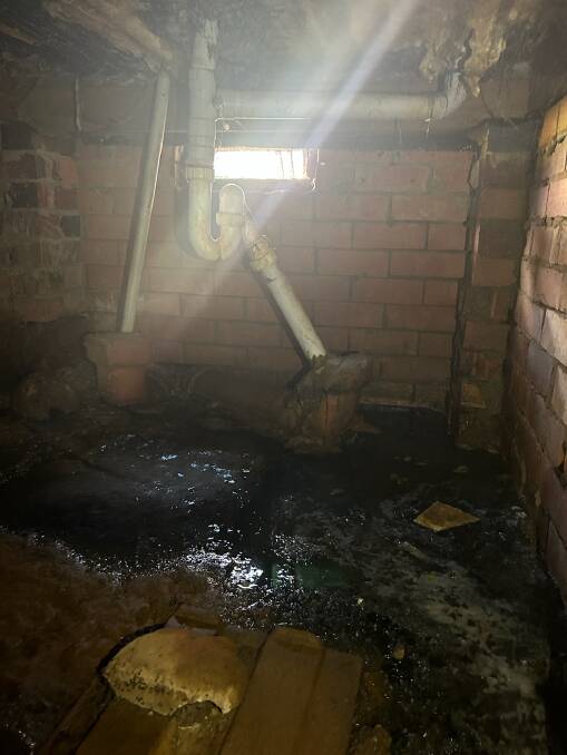 Underneath Stacey Whitton's home in Spring Street after it was discovered a sewer pipe had broken. Picture supplied