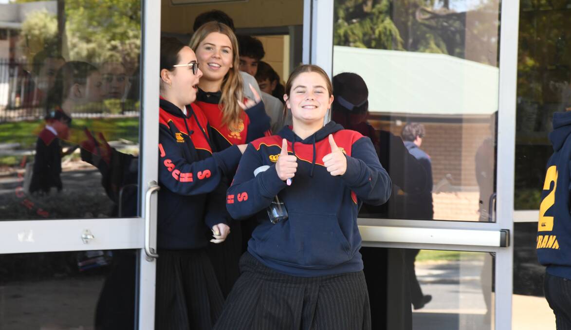 James Sheahan Catholic High School students exit the exam hall after their first HSC test of 2023. Picture by Carla Freedman