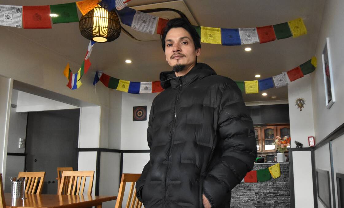 Santosh Kc inside Ram's Nepalese Restaurant in Orange. Picture by Riley Krause