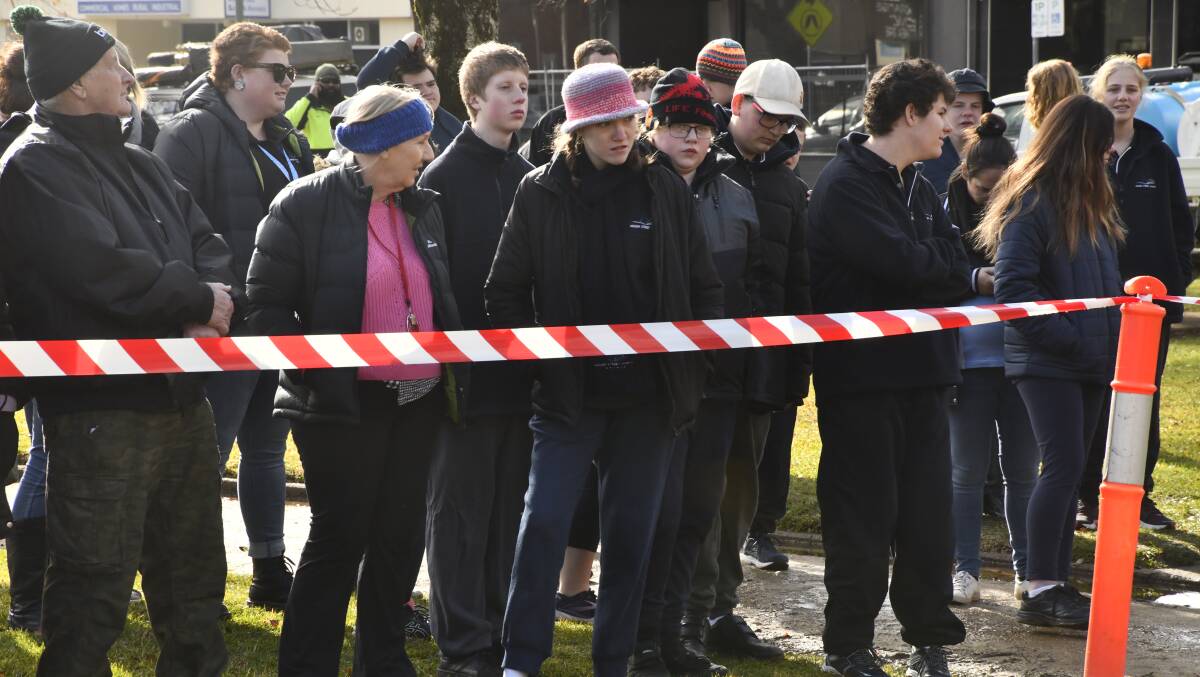 More than 100 people gathered in Robertson Park to watch the time capsule be dug up. Picture by Carla Freedman