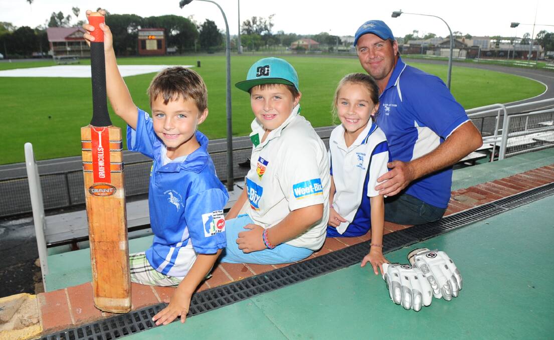 Jason Green with children Kyan, Cody and Nalani in 2014. Picture by Belinda Soole