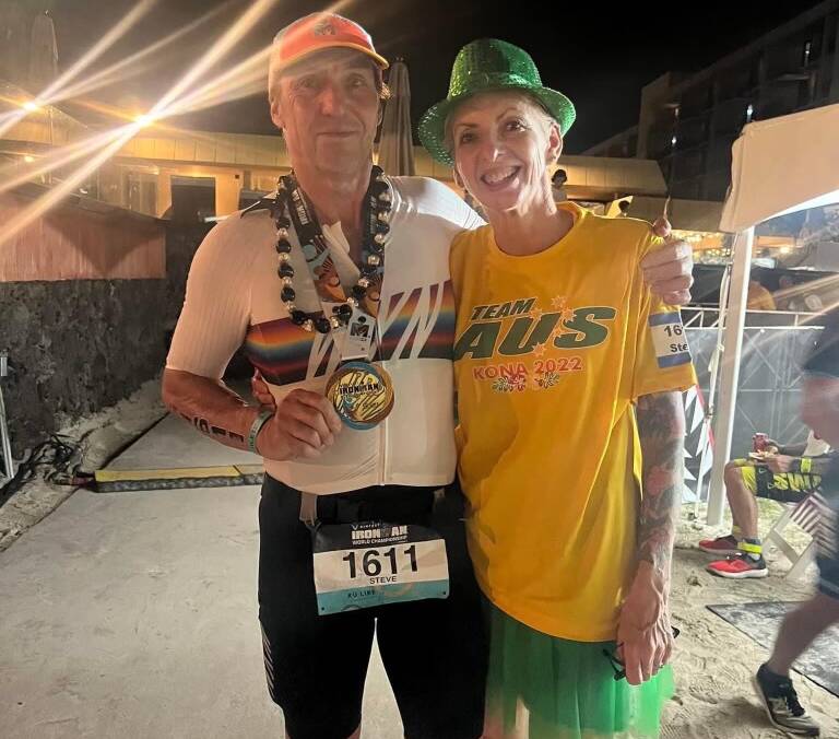 Steve Robinson with his wife Bernadette after completing the Kona Ironman. Picture supplied 