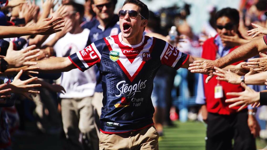 Daniel Mortimer celebrates with Roosters fans after the 2013 grand final, he thinks they're a chance again this year. Picture from file 