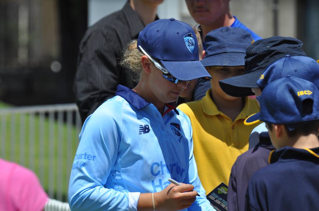 Phoebe Litchfield signs autographs at Wade Park. Picture by Lachlan Harper 
