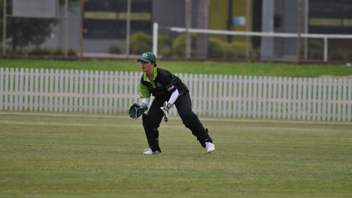 Katie Letcher wicket-keeping for Orange City. Picture from file 