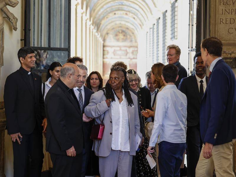 Whoopi Goldberg (centre) has joined fellow comedians in Italy for an audience with the Pope. (AP PHOTO)