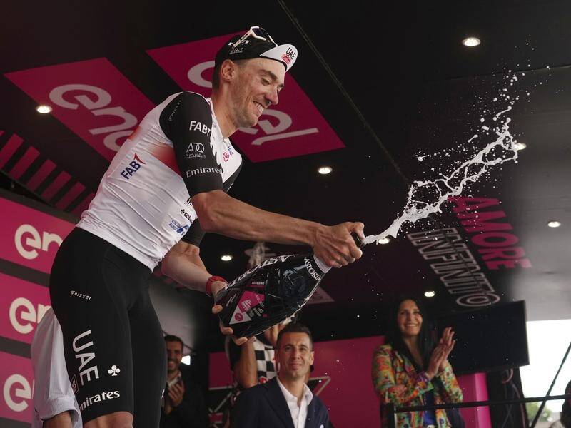 Brandon McNulty celebrates after winning the 15th stage of the Giro d'Italia in Bergamo. (AP PHOTO)