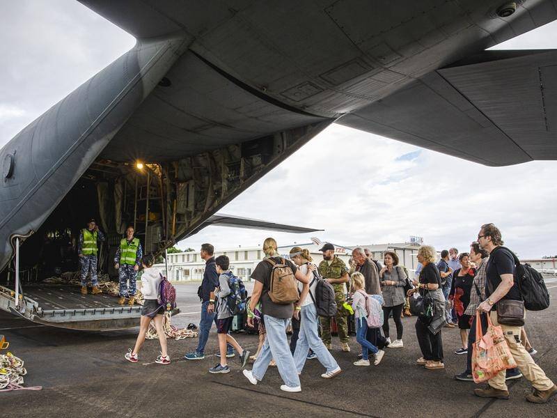 Royal Australian Air Force planes and a French-organised flight brought 187 Australians home. (AP PHOTO)