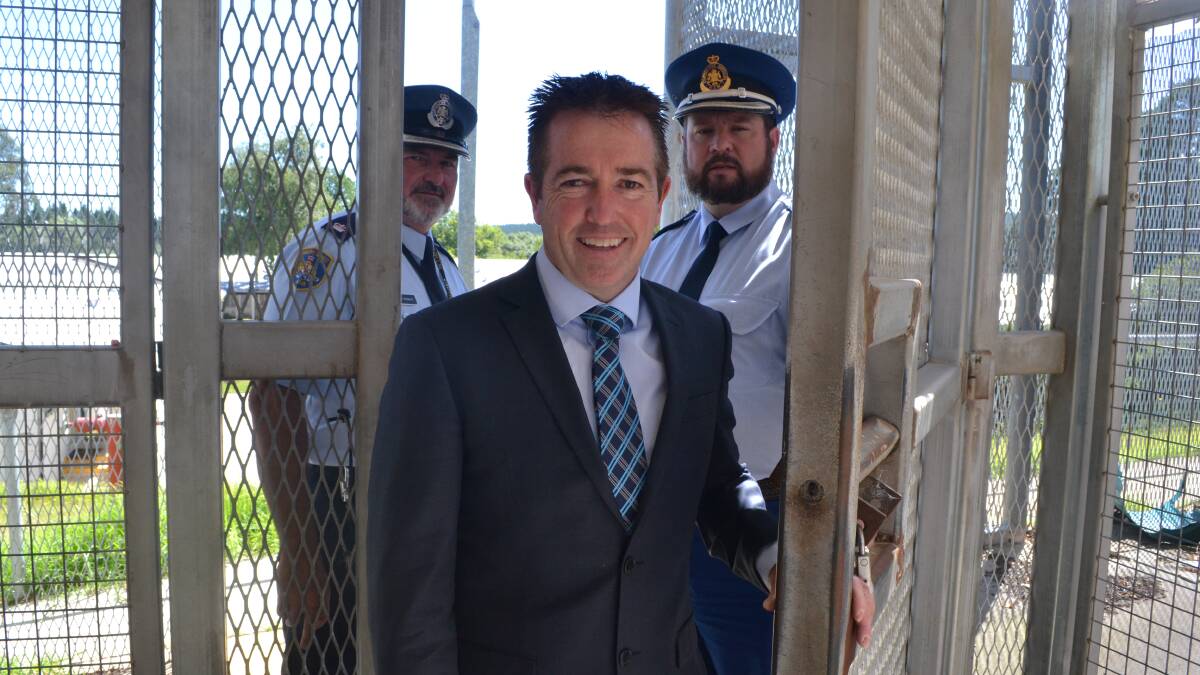 THE OLD CELL BLOCK: Bathurst MP Paul Toole (front with Bathurst Correctional Centre security manager Brad Peebles and general manager Bill Fittler at Kirkconnell Correctional Centre yesterday. Photo: BRIAN WOOD
